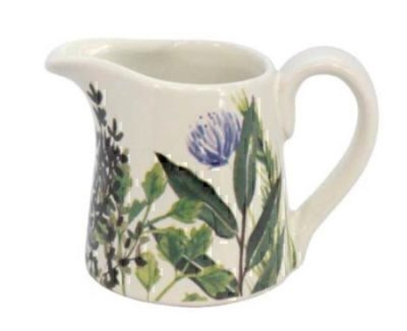 This Herbs Ceramic Jug by designer Gisela Graham would compliment the other products in the range. It is a lovely jug for milk for your breakfast table or for a sauce with dinner. The jug features a clover and selection of herbs design in purple and green. This would be a lovely gift for a gardener cook or chef. Made from ceramic. Size (LxWxD) 12x8.5x8cm